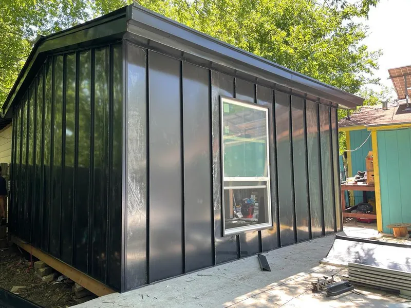 Black standing seam metal wall panels for Roof Inspection in Dry Run